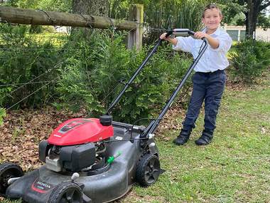 Michael at the mower, early years