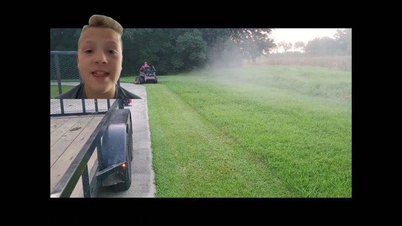 One of the brothers talking to the camera from the trailer on a route morning